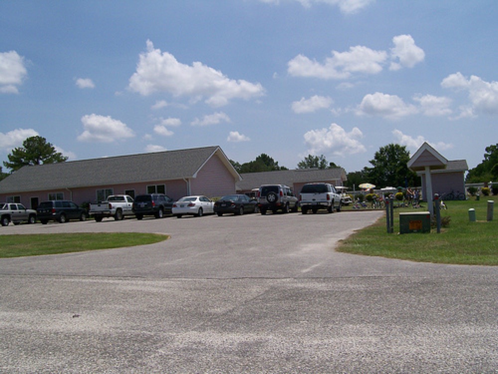 Parking lot with rvs at gulf breeze rv resort
