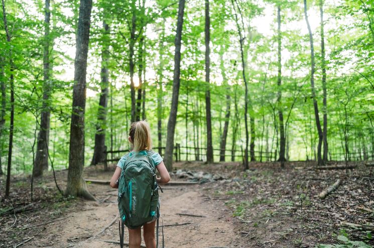 kid hiking with a backpack