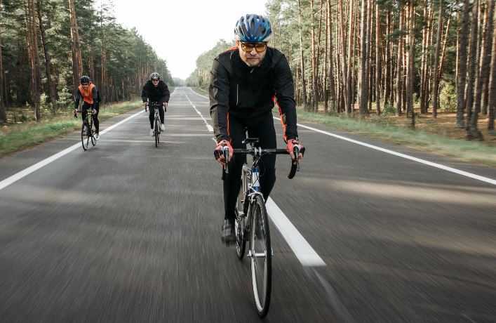 biker in helmet riding a bicycle