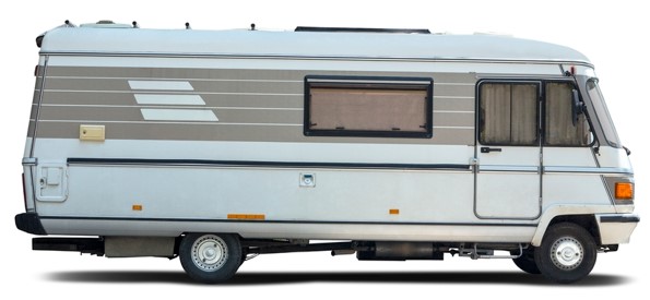 grey rv with many windows