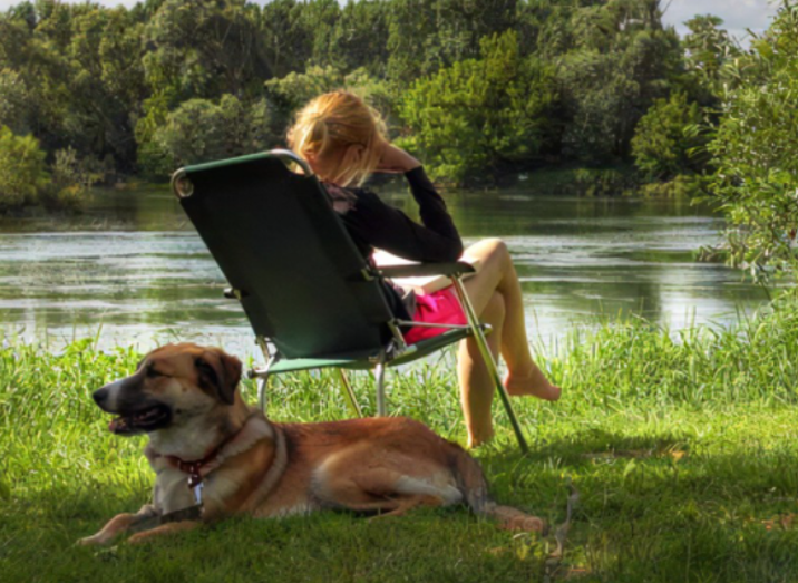woman and dog camping