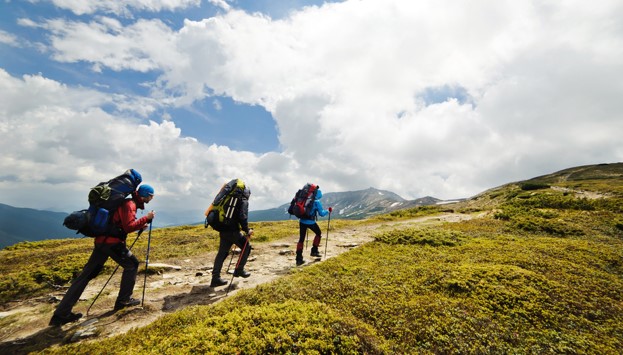 three people hiking