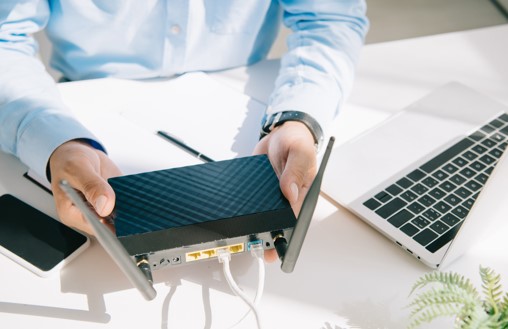 man holding a router