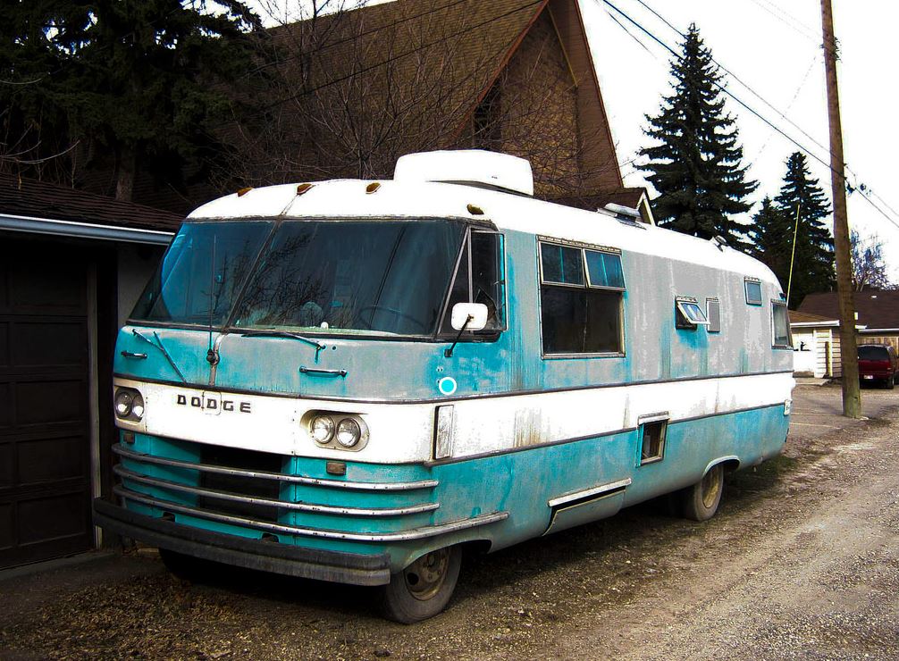 rv moochdocking beside a house