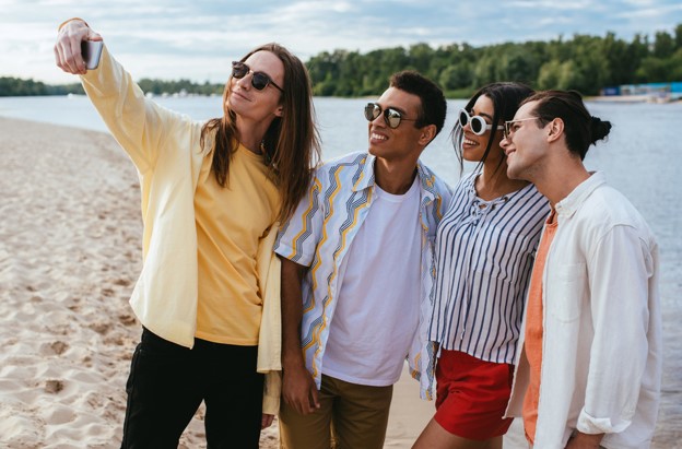 friends taking pictures on a vacation